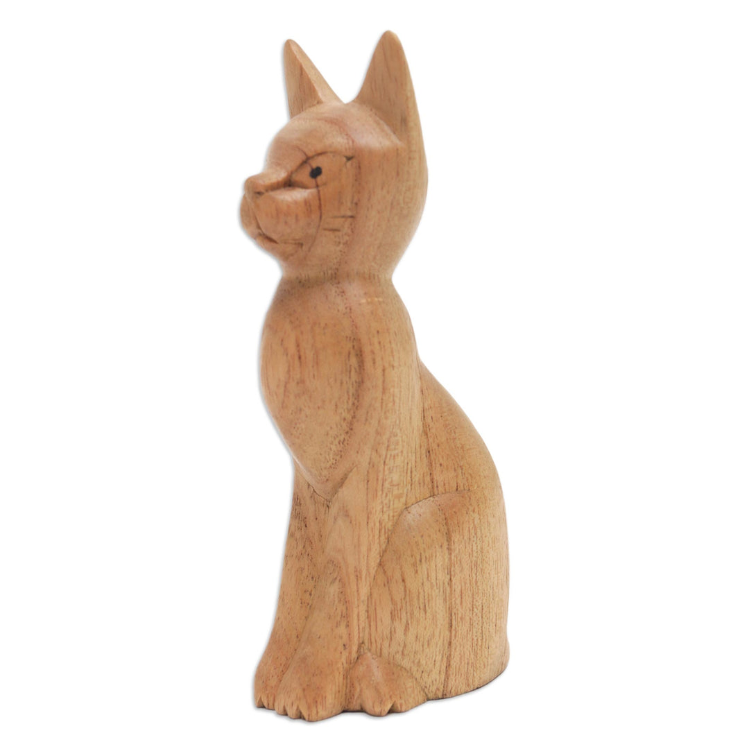 Brown Cat Sculpture Hand-Carved from Jempinis Wood in Bali - Cunning Cat