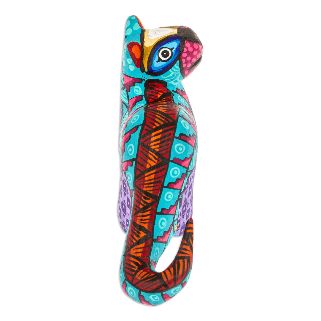 Iris Copal Wood Alebrije Otter Figurine Painted by Hand - The Water Spirit in Iris