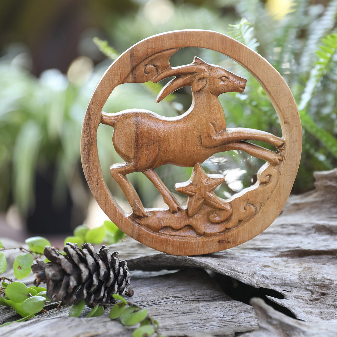 Capricorn-Themed Hand-Carved Round Suar Wood Relief Panel - Capricorn Firmament