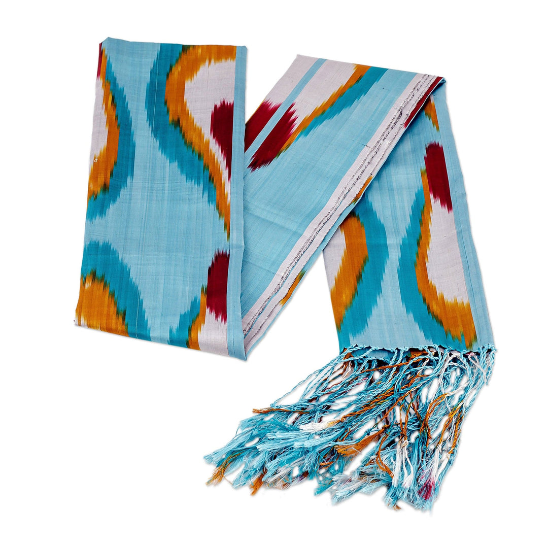 Handwoven Ikat-Patterned Silk Scarf in Blue and Warm Hues - Refreshing Uzbekistan
