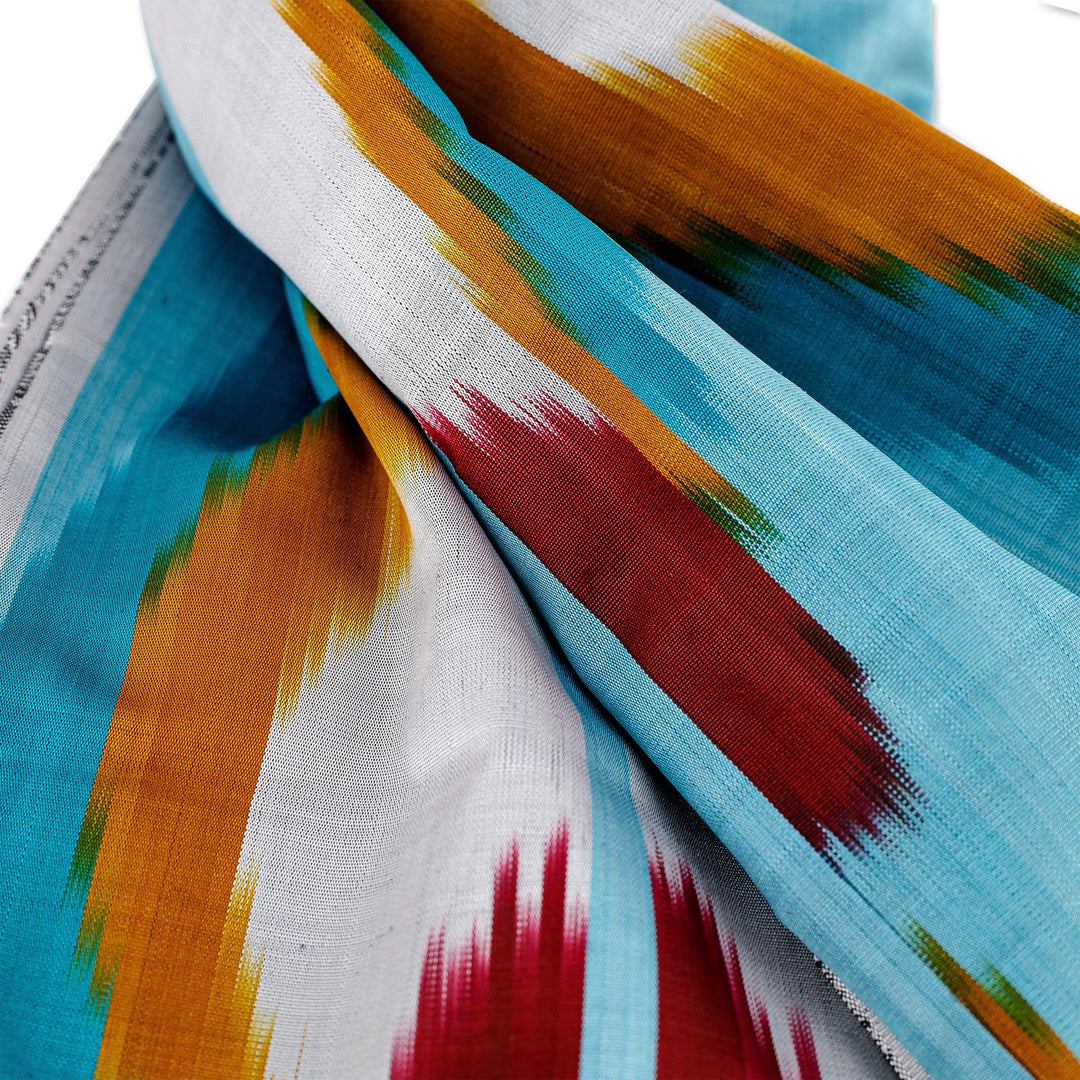 Handwoven Ikat-Patterned Silk Scarf in Blue and Warm Hues - Refreshing Uzbekistan