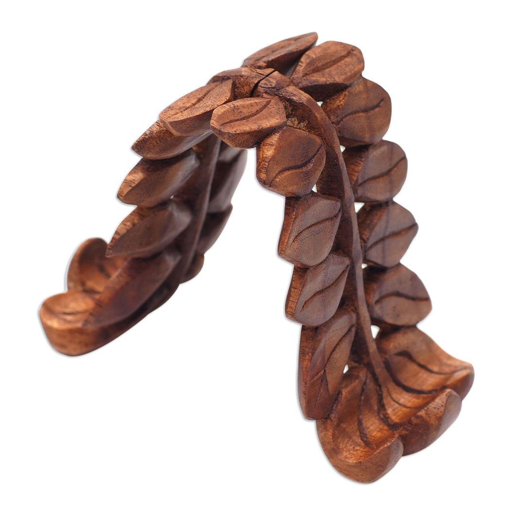 Hand-Carved Polished Leafy Jempinis Wood Phone Holder - The Leaves