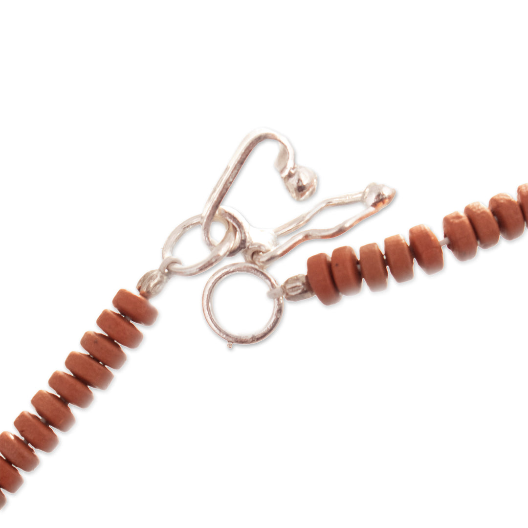 Traditional Dark Brown Ceramic Beaded Necklace from Peru - Land of Courage