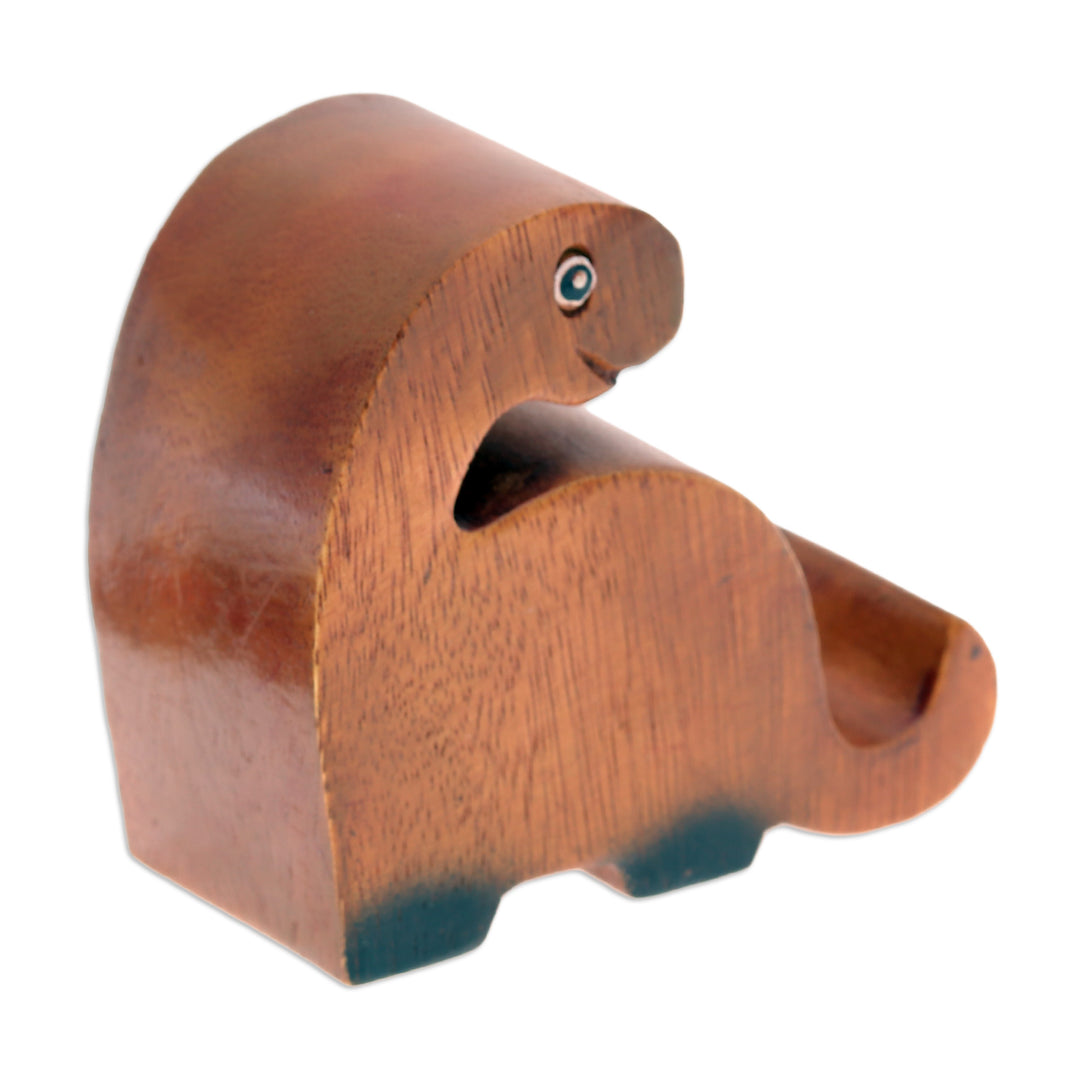 Hand-Carved Brown and Black Dino Raintree Wood Phone Holder - Dino Assistant