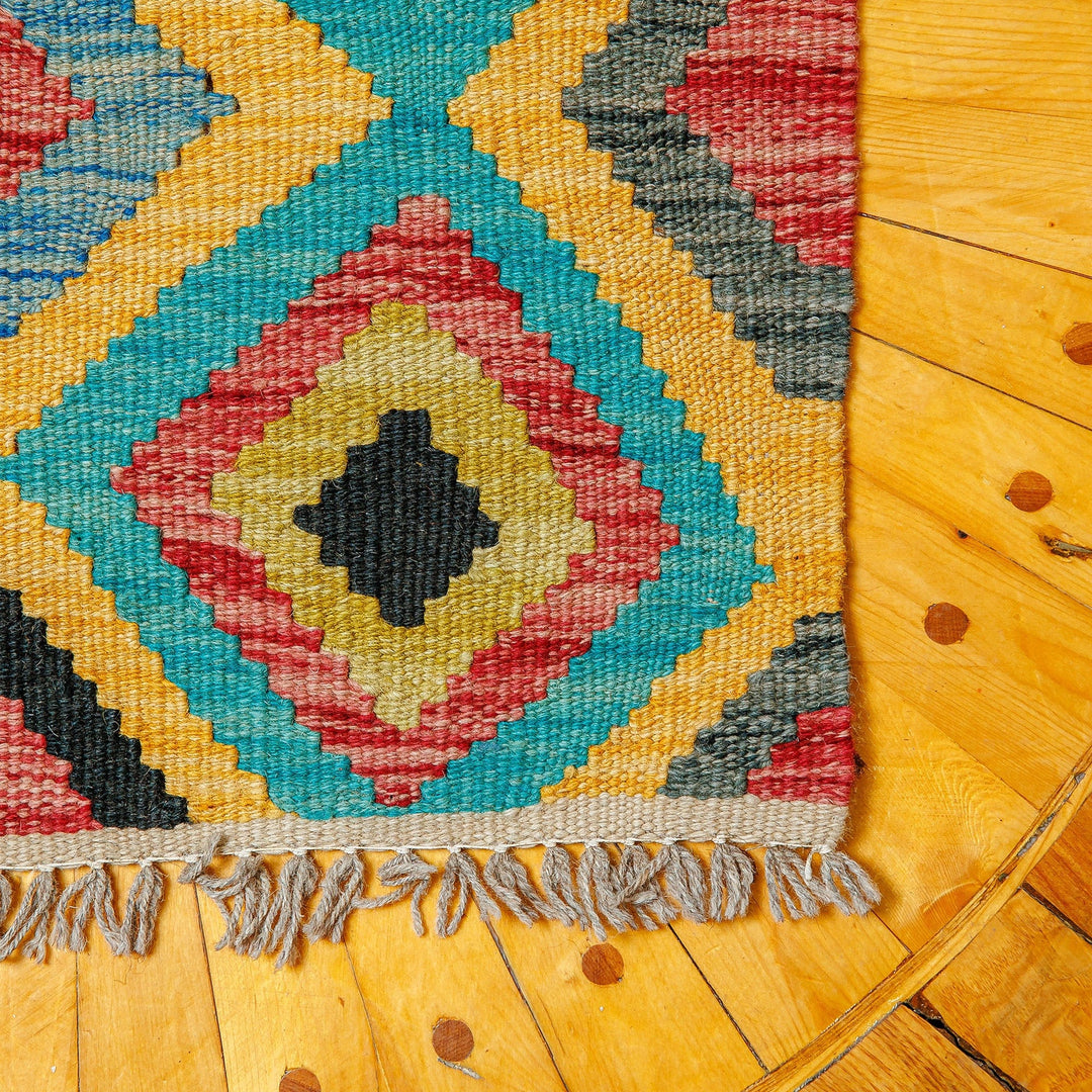 1.5x1.5 Hand-Knotted Rhombus-Themed Fringed Wool Area Rug - Geometric Splendor
