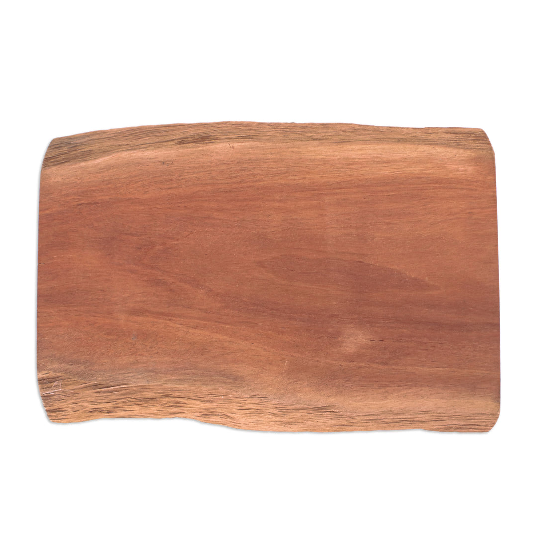 Hand-Carved Longan Wood Legged Cutting Board from Thailand - Delicious Slice