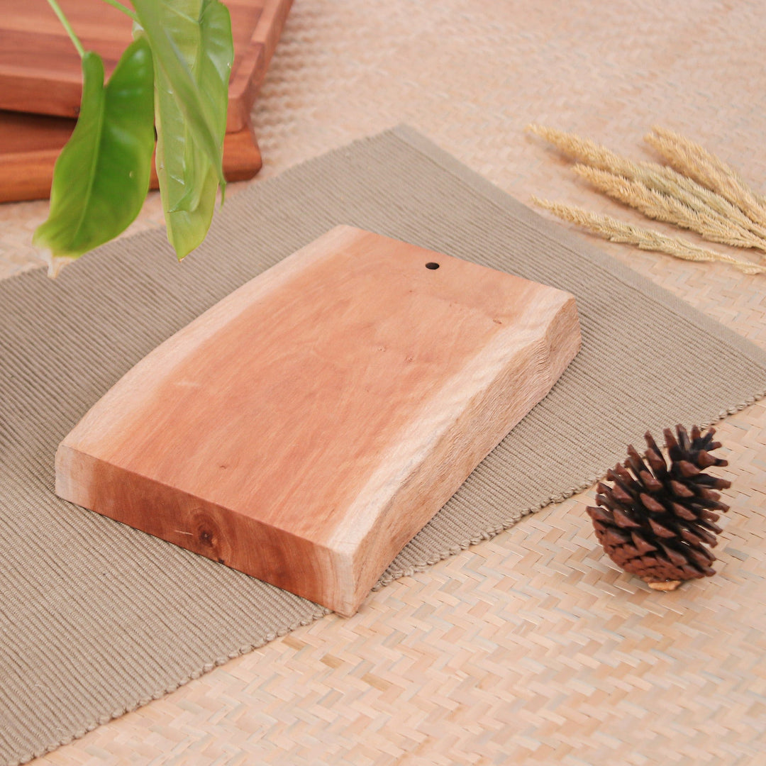 Hand-Carved Sturdy Longan Wood Cutting Board from Thailand - Strong Flavors