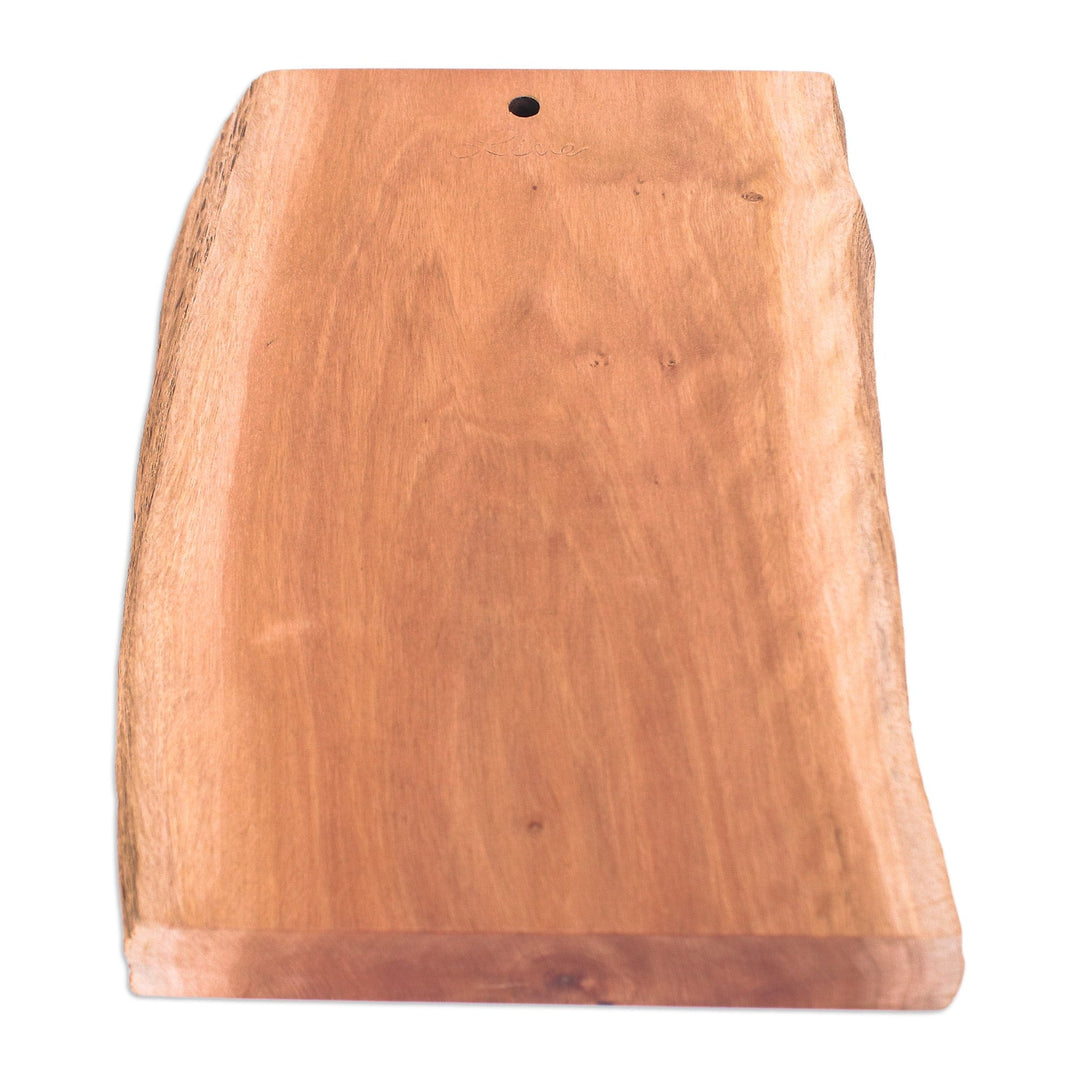 Hand-Carved Sturdy Longan Wood Cutting Board from Thailand - Strong Flavors