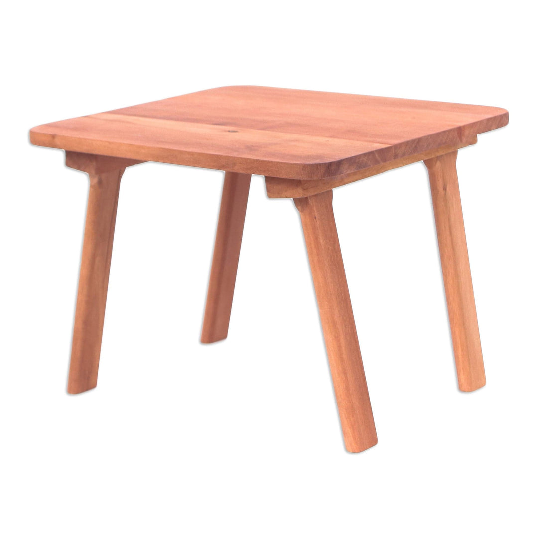 Hand-Carved Minimalist Brown Longan Wood Stool from Thailand - Discreet Comfort
