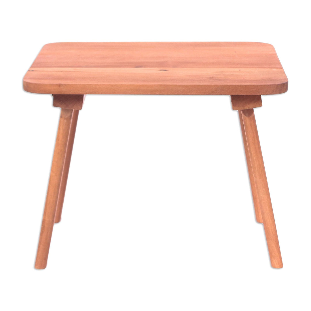 Hand-Carved Minimalist Brown Longan Wood Stool from Thailand - Discreet Comfort