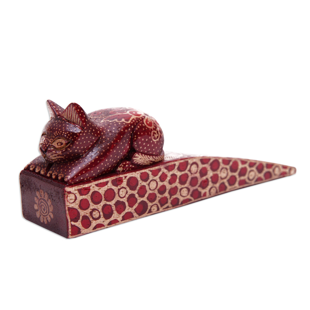 Handmade Batik Cat-Shaped Pule Wood Door Stop in Warm Hues - Feline Space