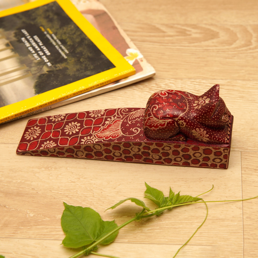 Handmade Batik Cat-Shaped Pule Wood Door Stop in Warm Hues - Feline Space