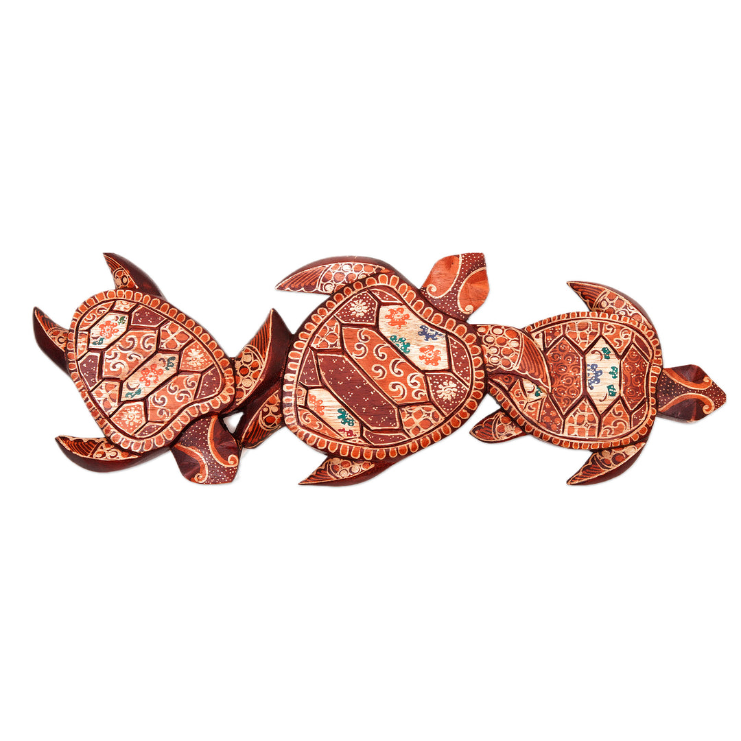 Handcrafted Batik Turtle-Themed Pule Wood Wall Art from Java - Family Turtle