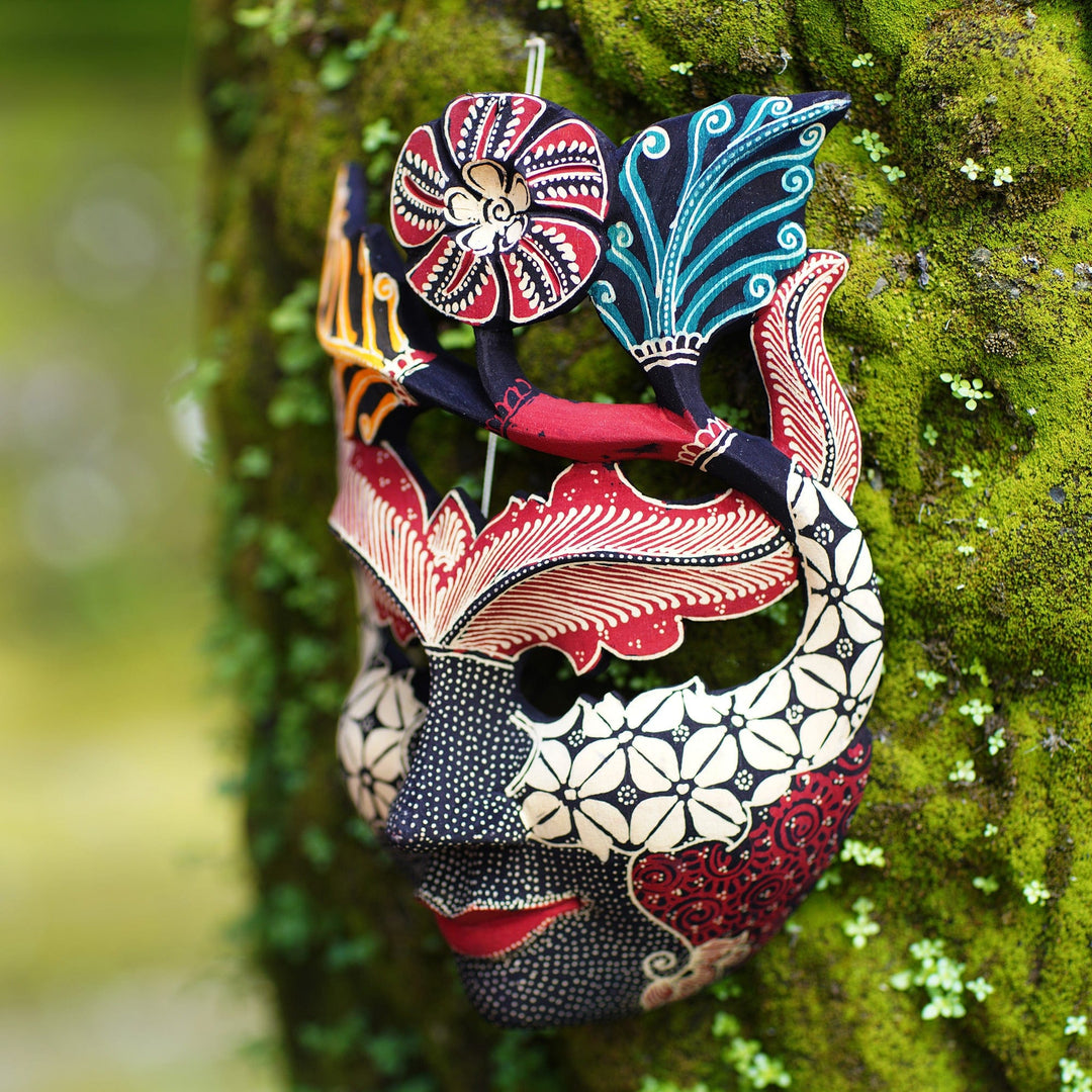 Handcrafted Hibiscus-Themed Batik Pule Wood Mask from Java - Princess of Hibiscus
