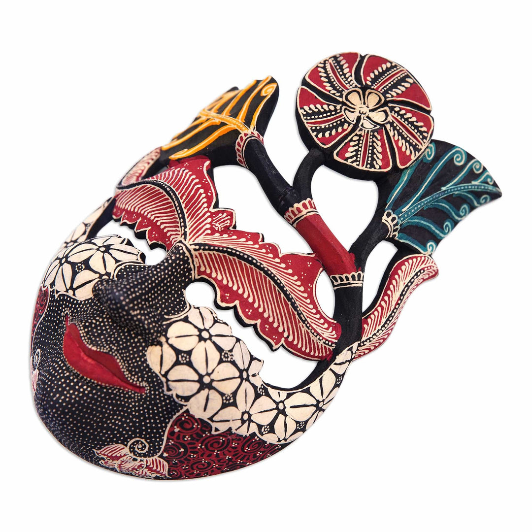 Handcrafted Hibiscus-Themed Batik Pule Wood Mask from Java - Princess of Hibiscus