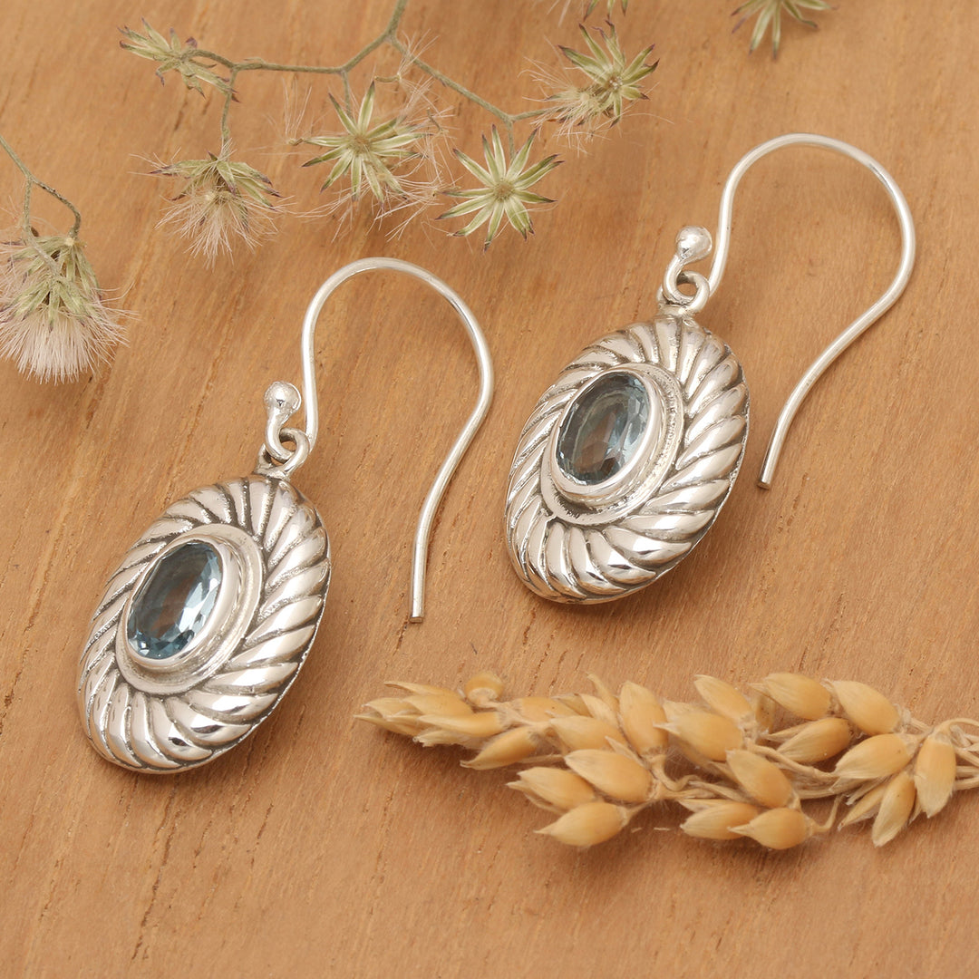 Oval Spiral Faceted Two-Carat Blue Topaz Dangle Earrings - Spiral Water