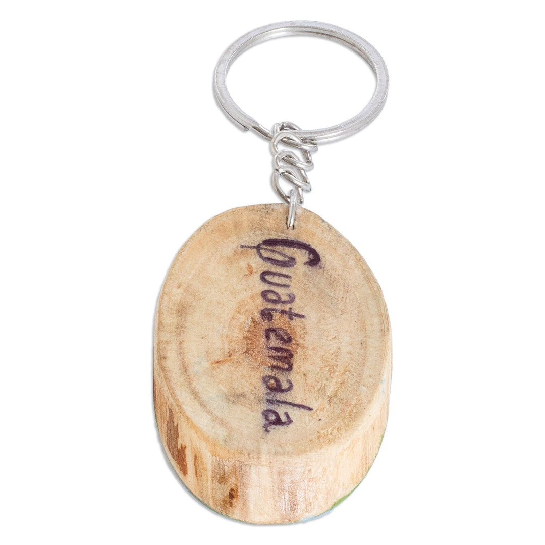 Hand-Carved Pinewood Keychain with Antigua's Arch Painting - Antigua's Charm