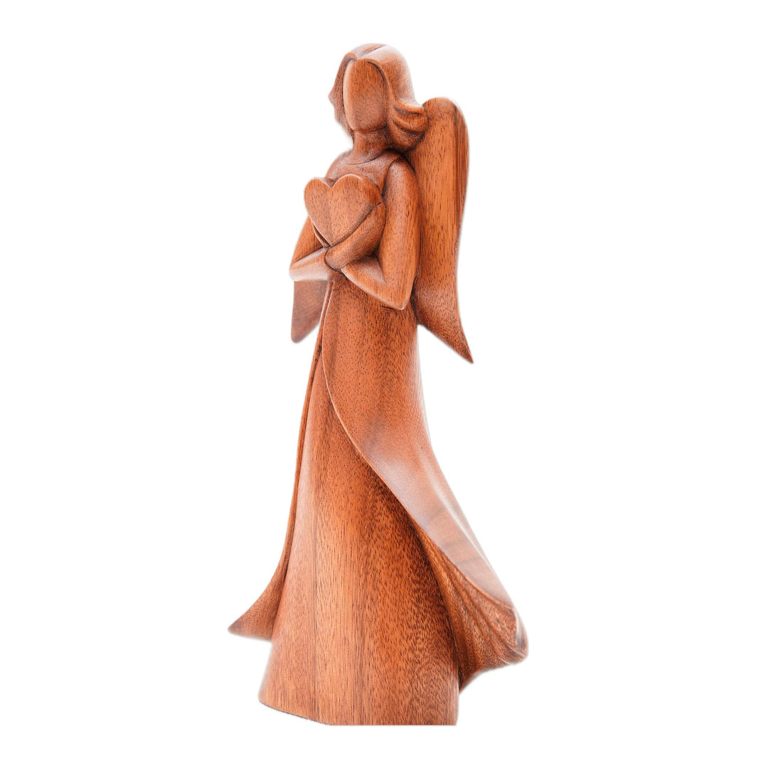 Angel and Heart-Themed Suar Wood Sculpture from Bali - Loving Archangel