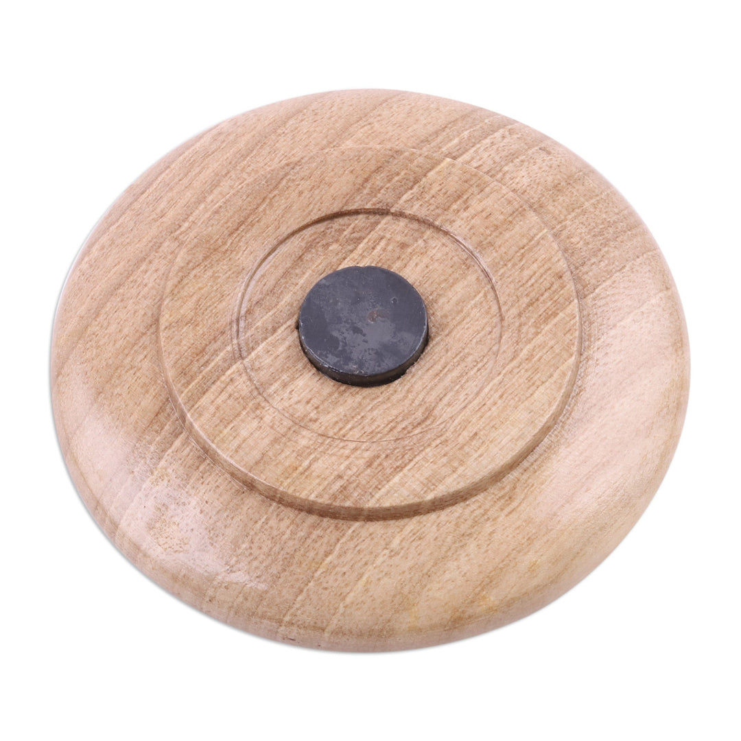 Hand-Carved Floral Round Walnut Wood Magnet from Uzbekistan - The Floral Eden