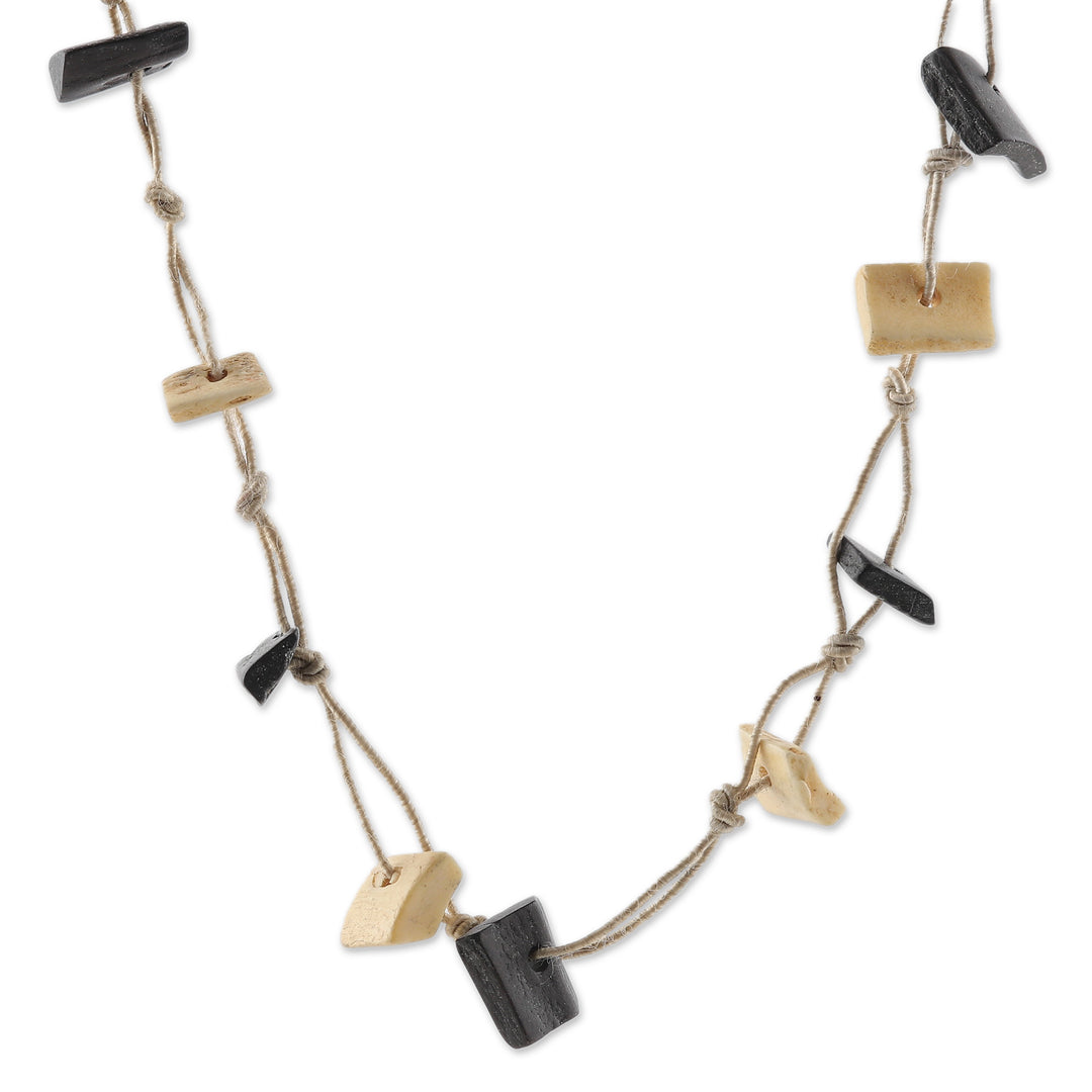 Hand-Carved Long Beaded Necklace in Ivory and Black Hues - Everlasting Magic