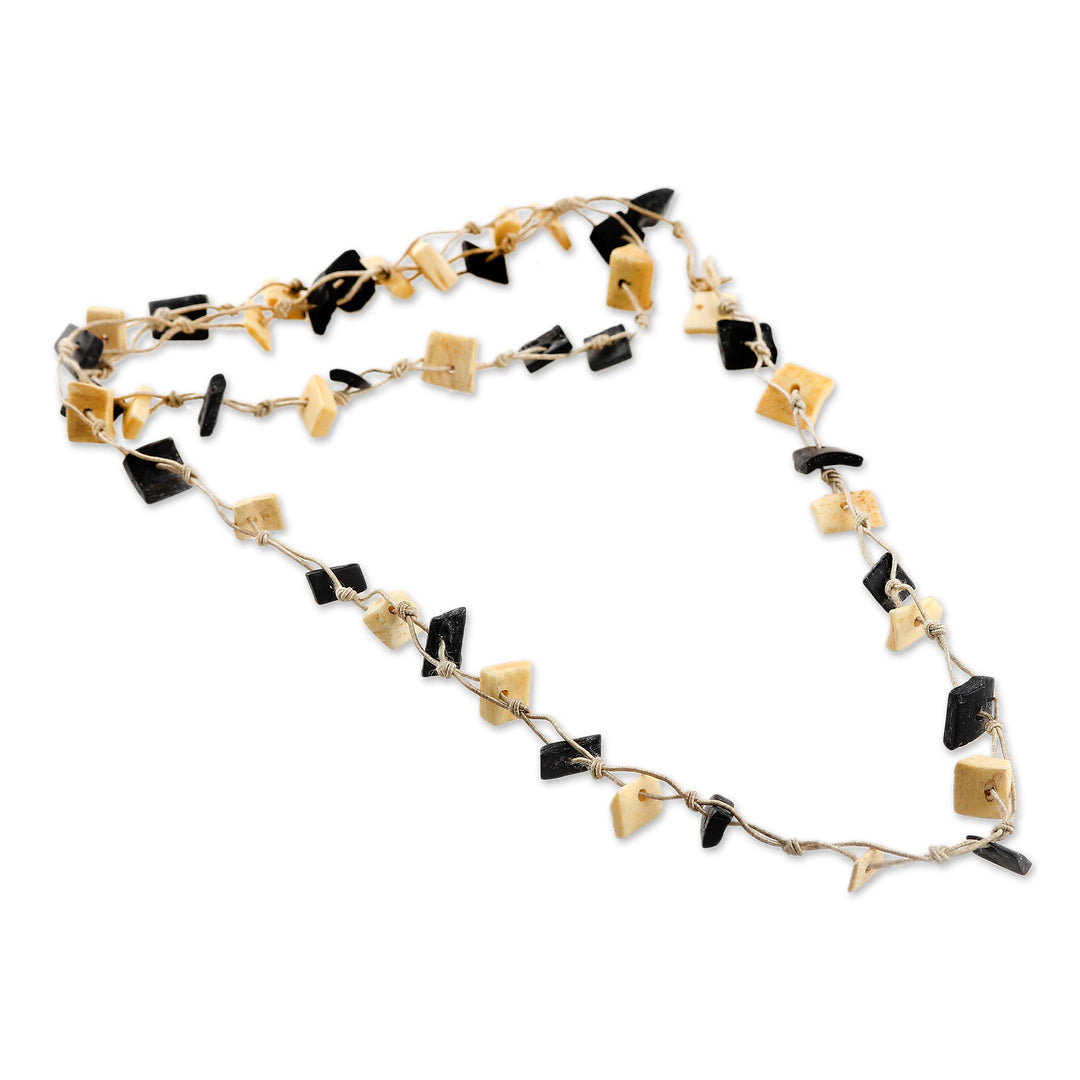 Hand-Carved Long Beaded Necklace in Ivory and Black Hues - Everlasting Magic
