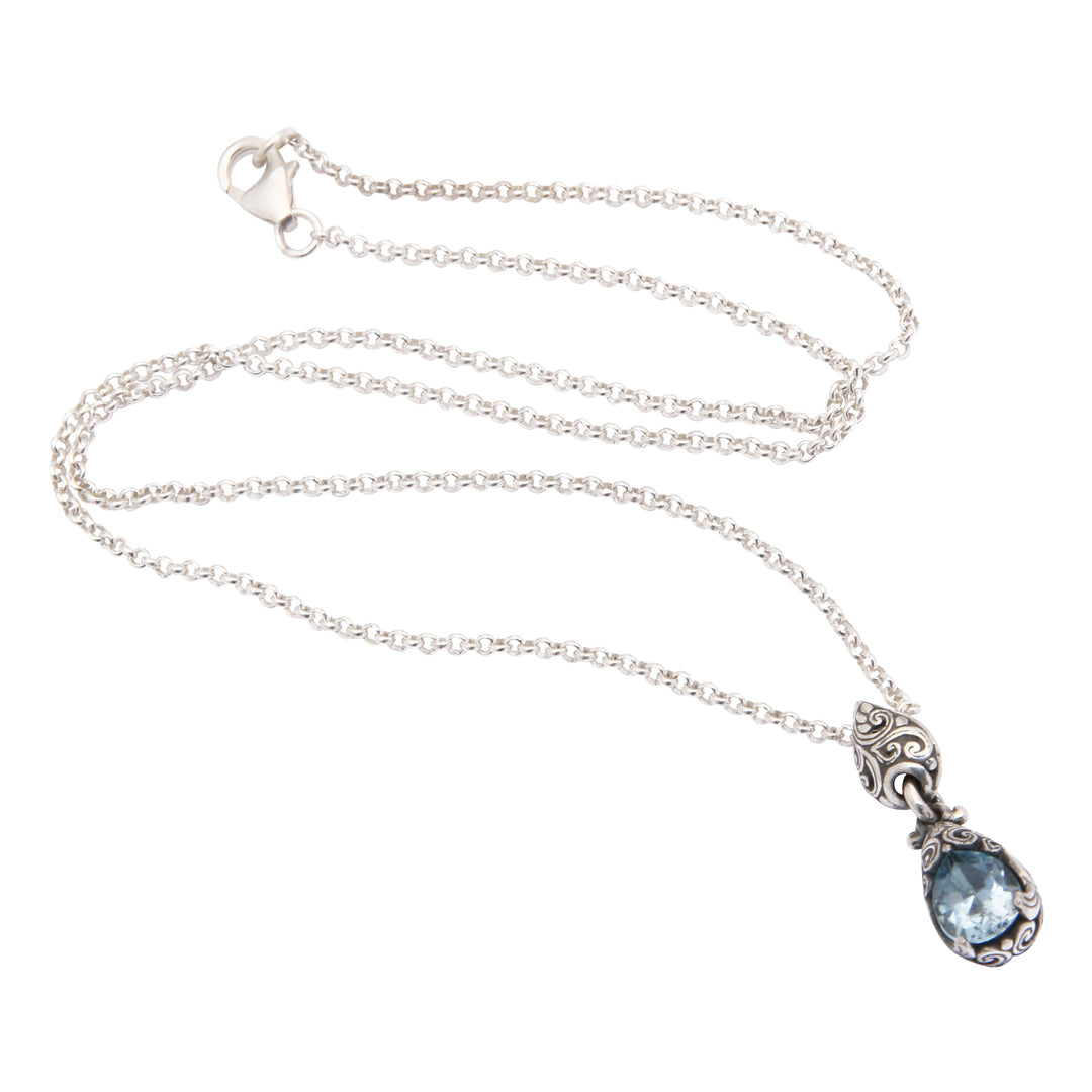 Silver Pendant Necklace with One-Carat Blue Topaz Gemstone - Bird Nest