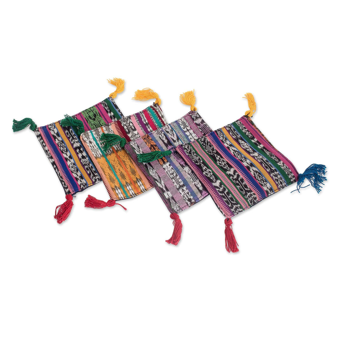Set of Four Handwoven Cotton Coasters with Colorful Tassels - Trendy Traditions