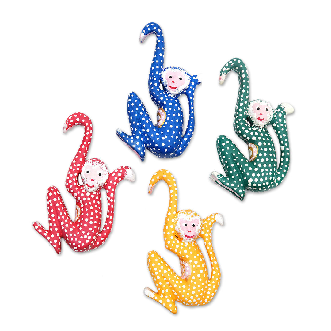 Set of 4 Painted Tropical Albesia Wood Monkey Ornaments - Jumping Monkeys