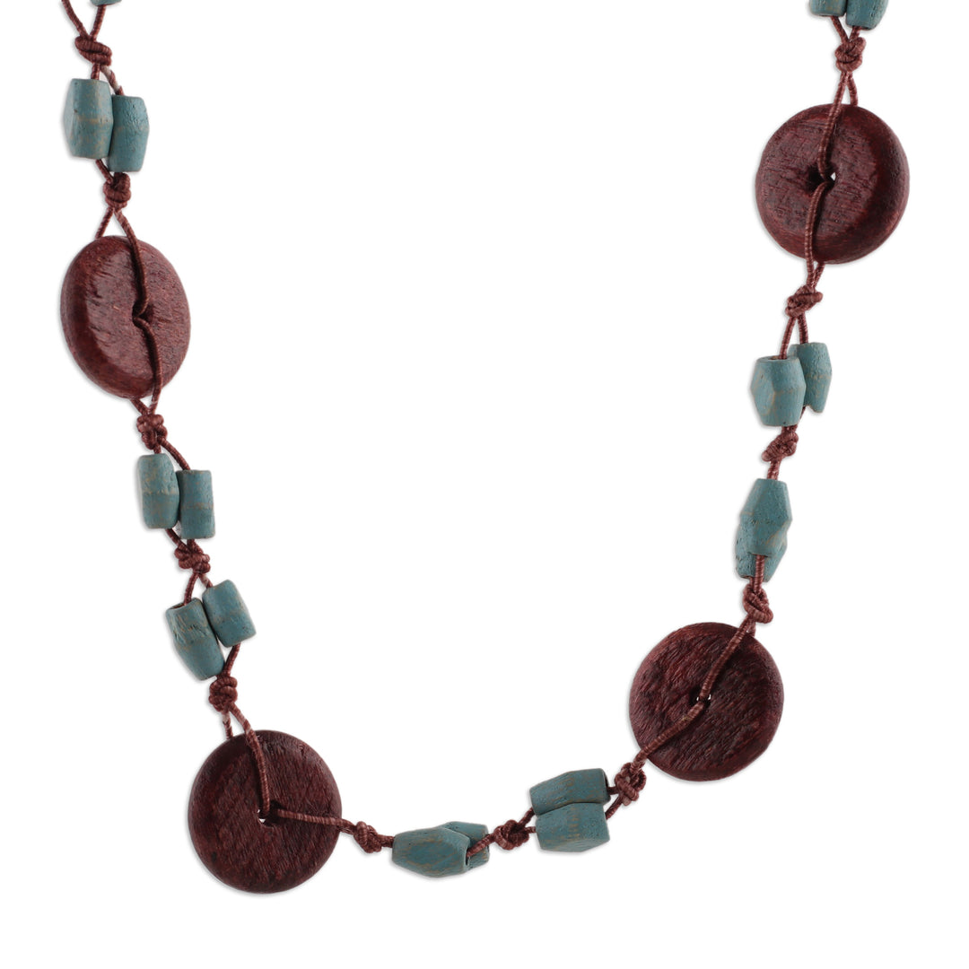 Hand-Carved Wood Beaded Long Necklace in Brown and Aqua Hues - Graceful Fusion