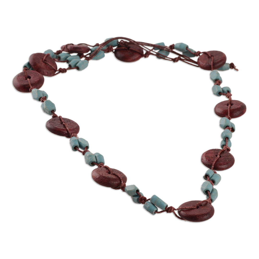 Hand-Carved Wood Beaded Long Necklace in Brown and Aqua Hues - Graceful Fusion