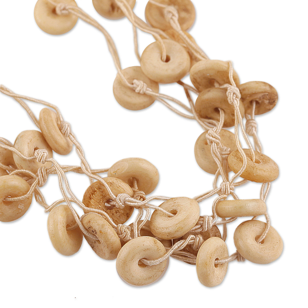 Bohemian Handcrafted Ivory Cotton Station Strand Necklace - Natural Loops