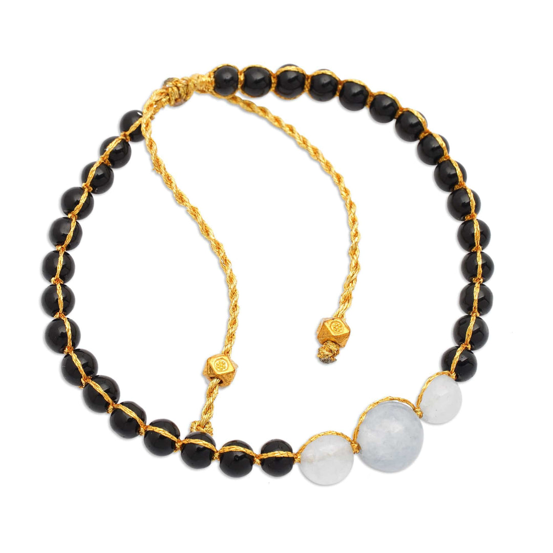 Balinese-Crafted Golden Onyx and Aquamarine Beaded Bracelet - Peace in Darkness