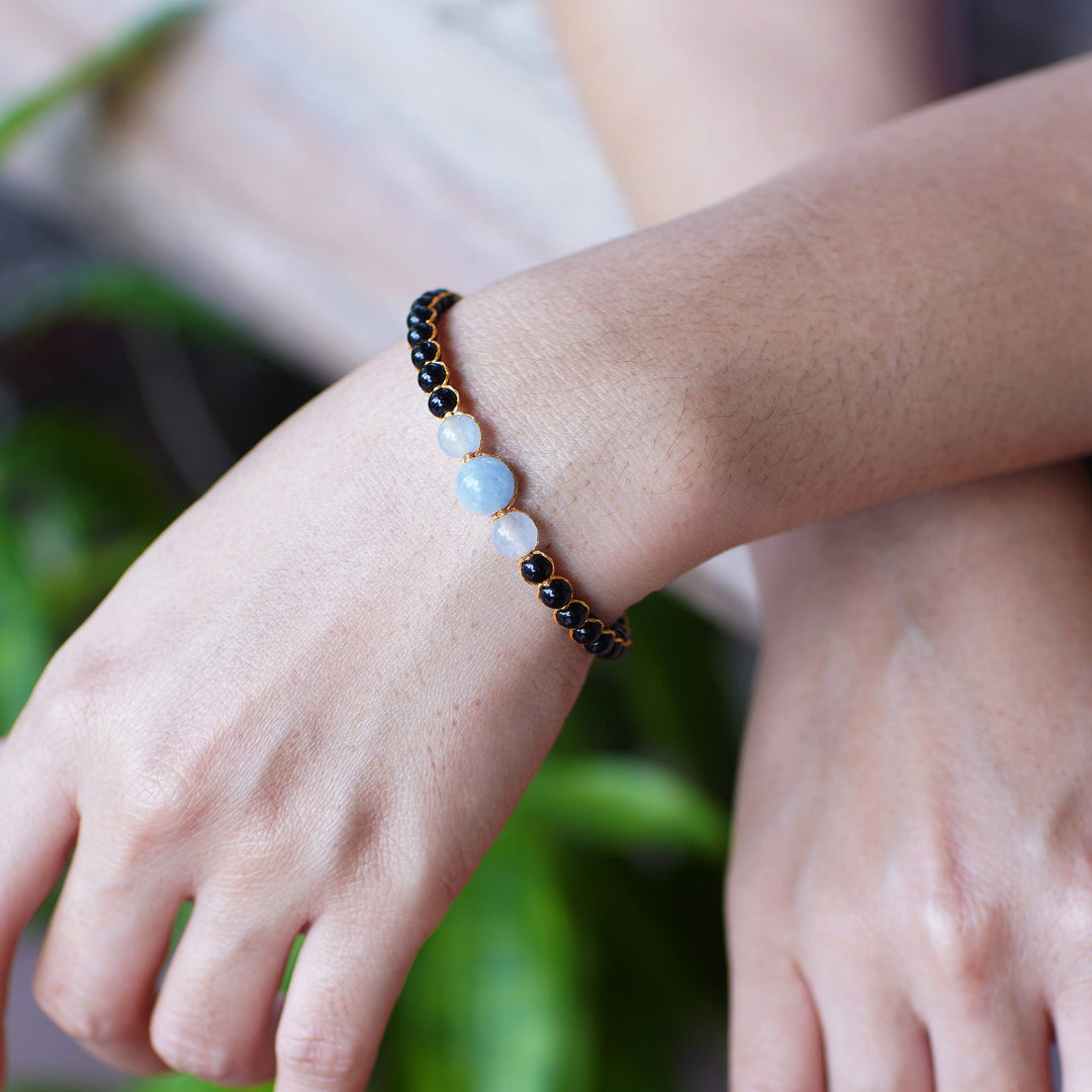 Balinese-Crafted Golden Onyx and Aquamarine Beaded Bracelet - Peace in Darkness