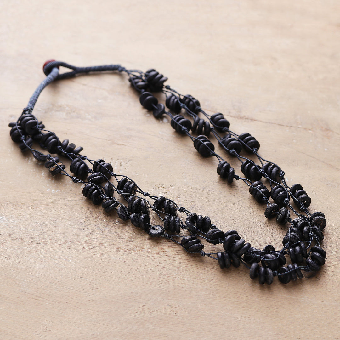 Handcrafted Haldu Wood Beaded Three-Strand Necklace in Black - Midnight Loops