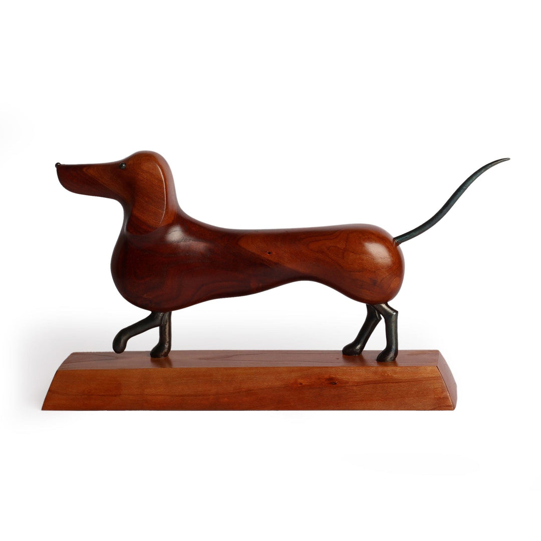 Hand-Carved Dachshund-Themed Apricot Wood and Iron Sculpture - Tenacious Paws
