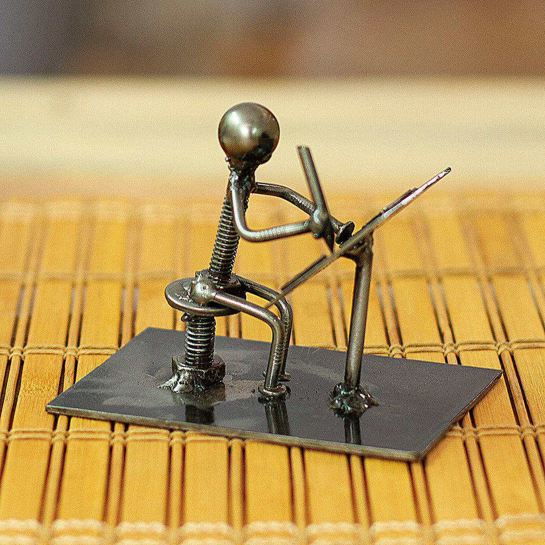 Recycled Metal Figurine of Architect Working on Plans - Architect at Work