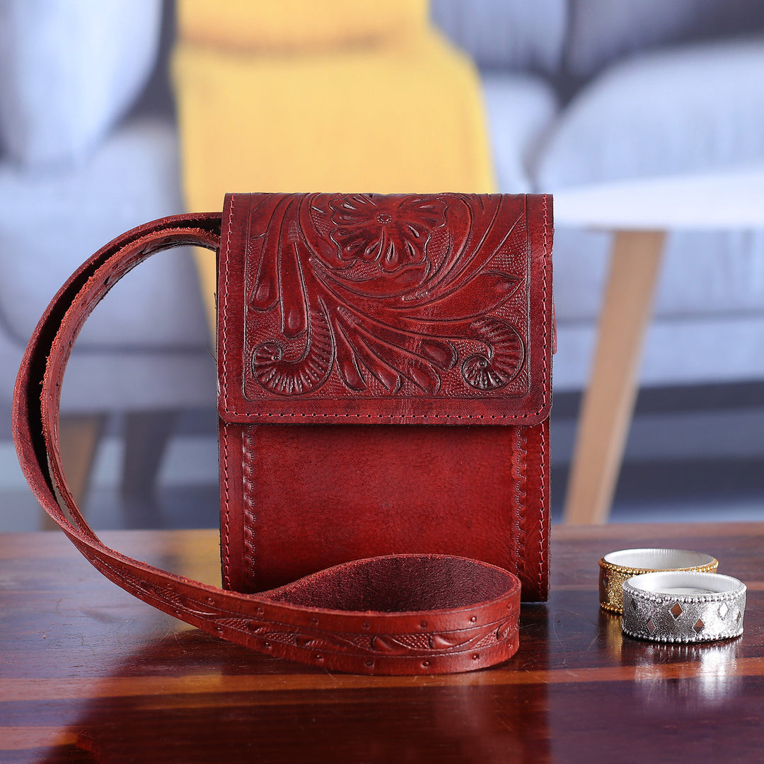 Red Leather Sling Bag with Embossed Floral and Paisley Motif - Timeless Elegance in Russet
