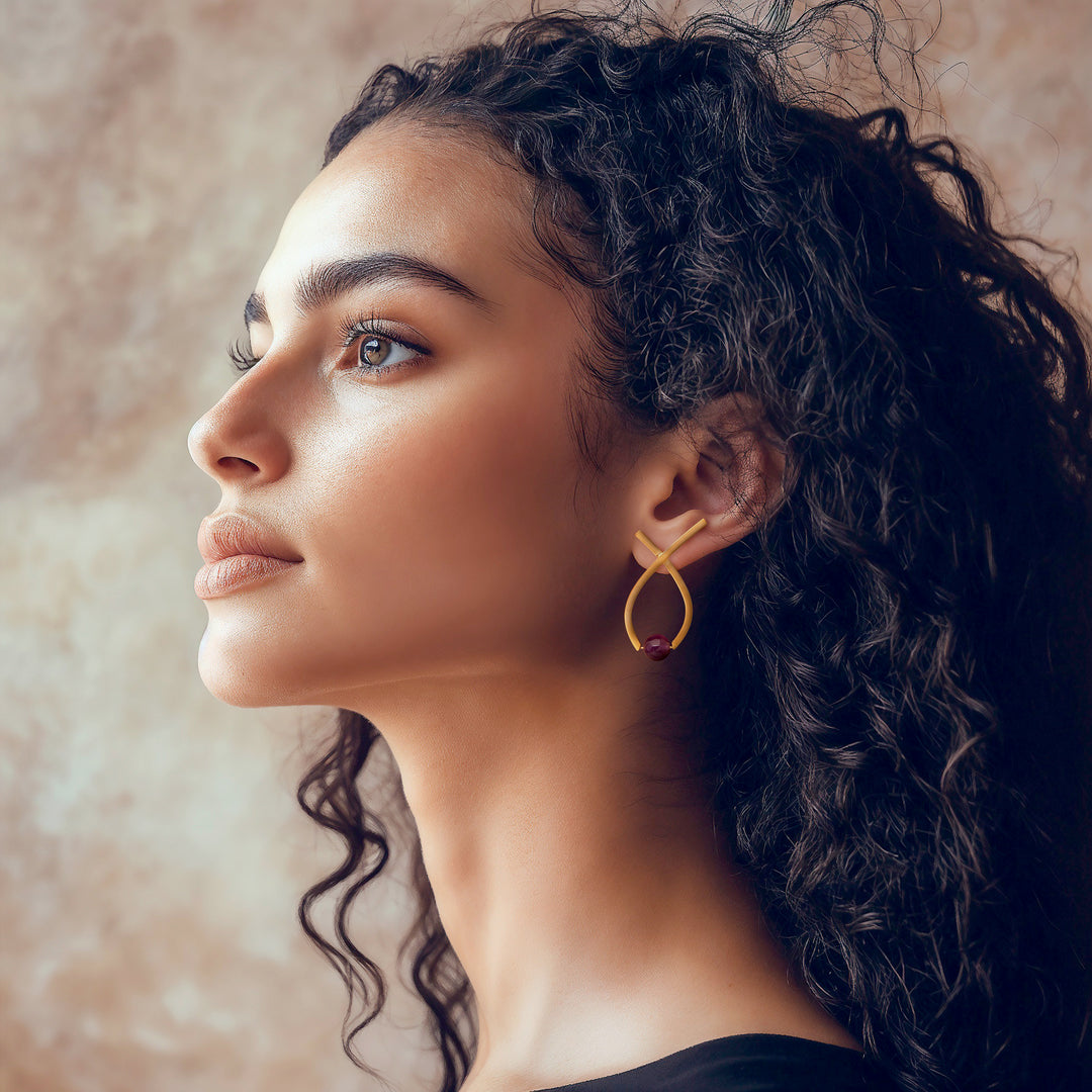 Semi-Abstract Gold-Plated Drop Earrings with Amethyst Gems - Sagacious Ribbon