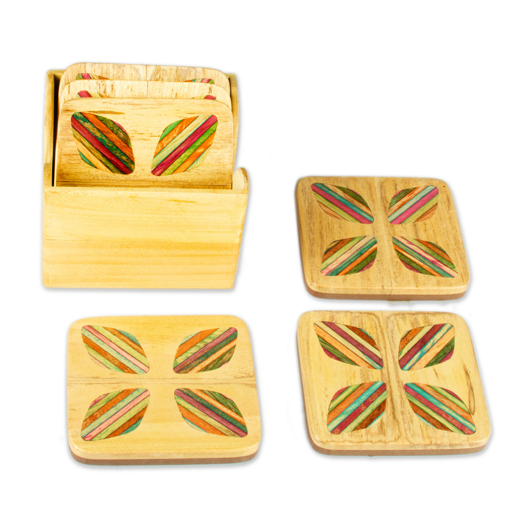 Hand-Carved Floral 6-Piece Mango and Haldu Wood Coaster Set - Petal Celebration