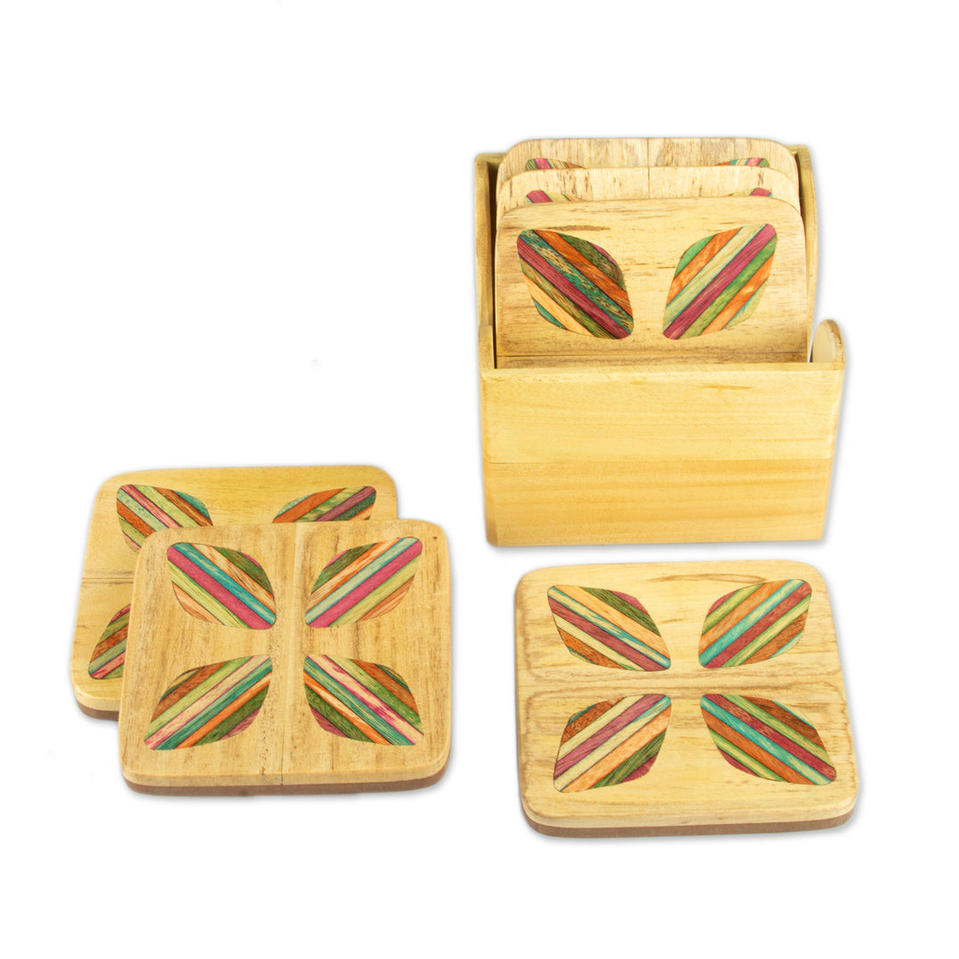 Hand-Carved Floral 6-Piece Mango and Haldu Wood Coaster Set - Petal Celebration