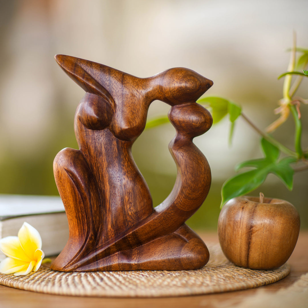 Handcrafted Romantic Wood Sculpture - Elegant Kiss