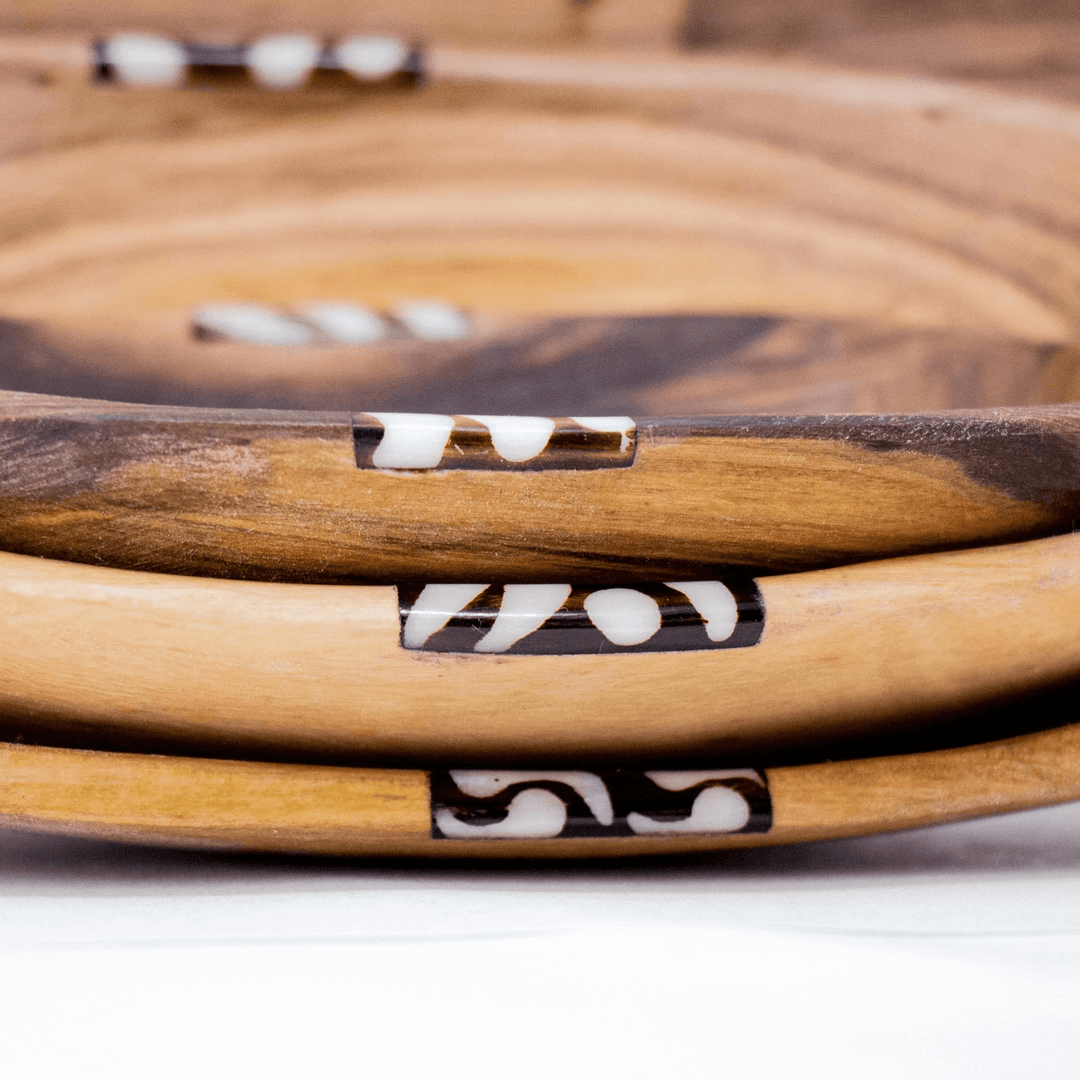 Three Nested Oval Olive Wood Serving Bowls with Bone Inlay