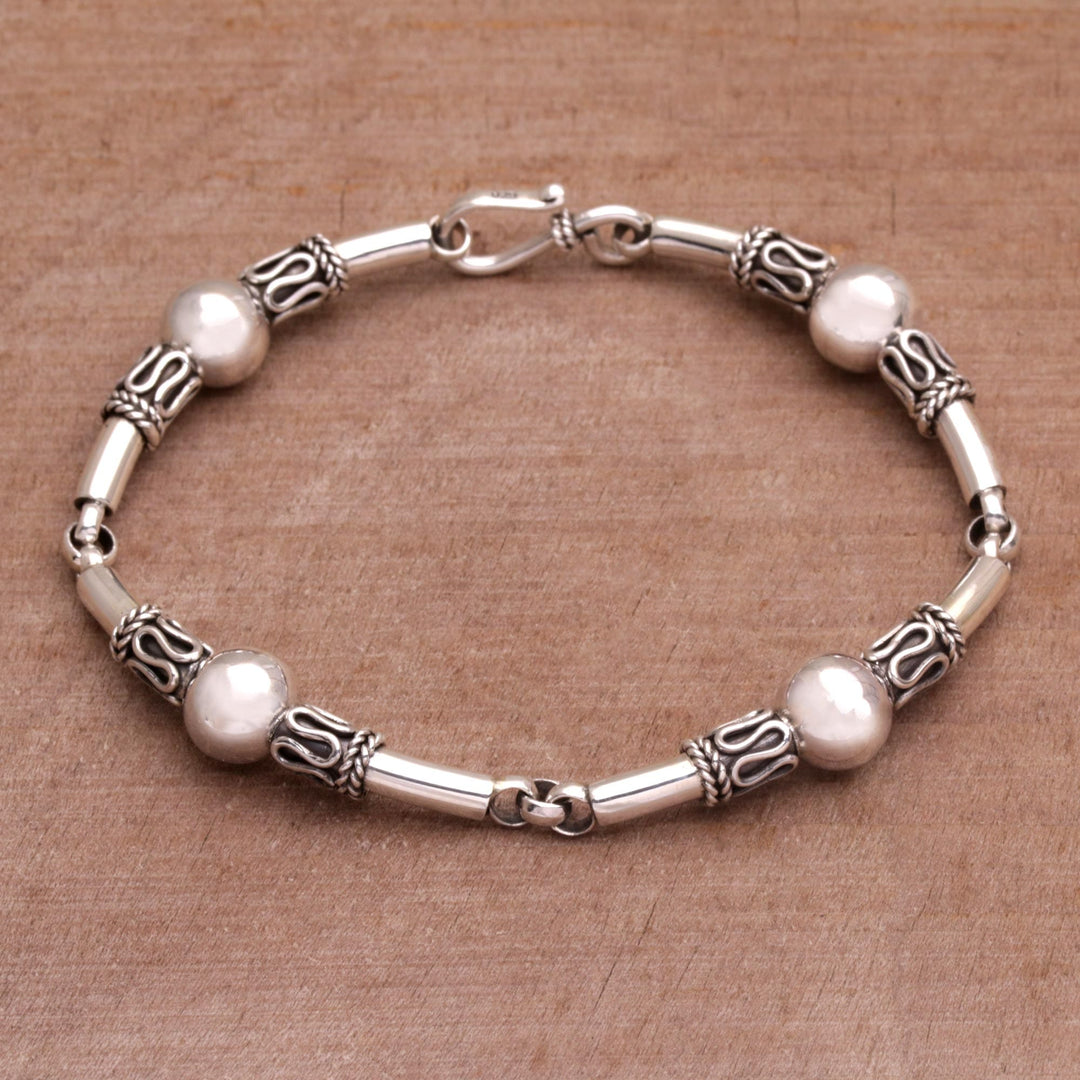 Sterling Silver Link Bracelet with Balinese Designs - Tubes