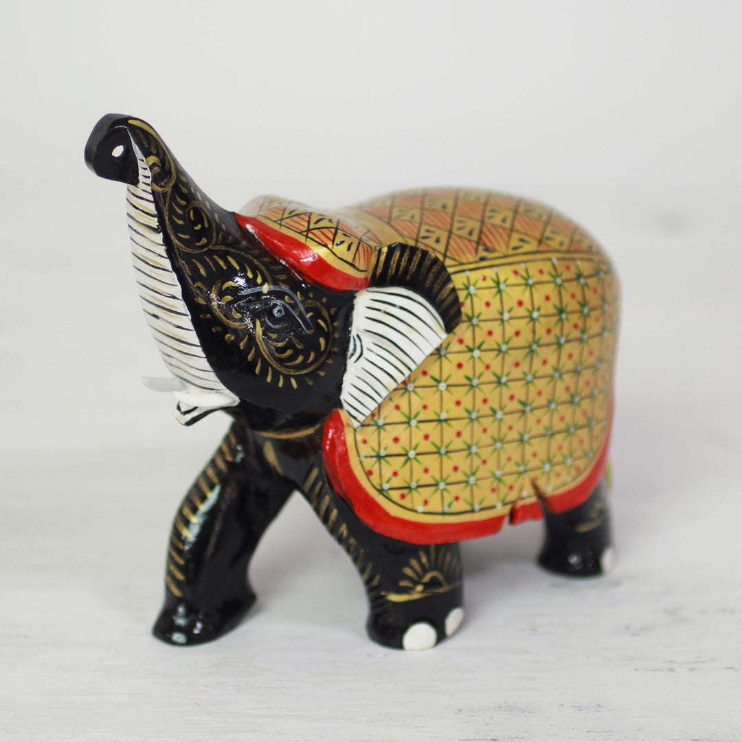 Handcrafted Black Elephant Wood Figurine with Golden Coat - Elephant Fortune
