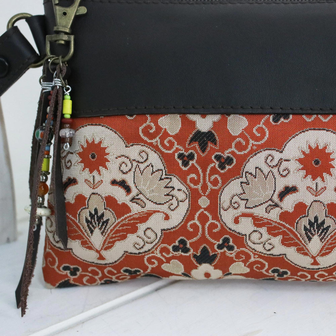 Leather Accent Silk Floral Wristlet in Pumpkin from Thailand - Chiang Mai Bouquet