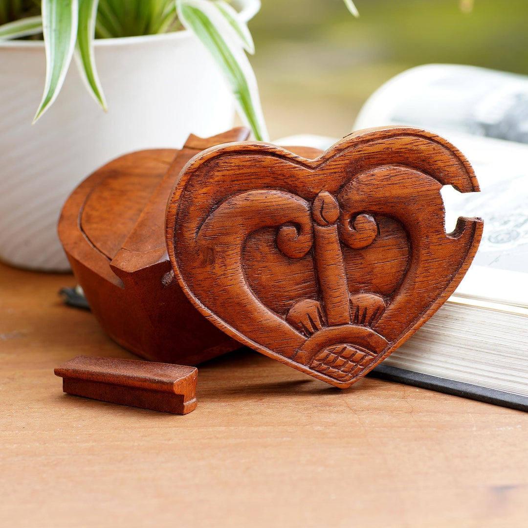 Artisan Crafted Suar Wood Puzzle Box - Tug of Love