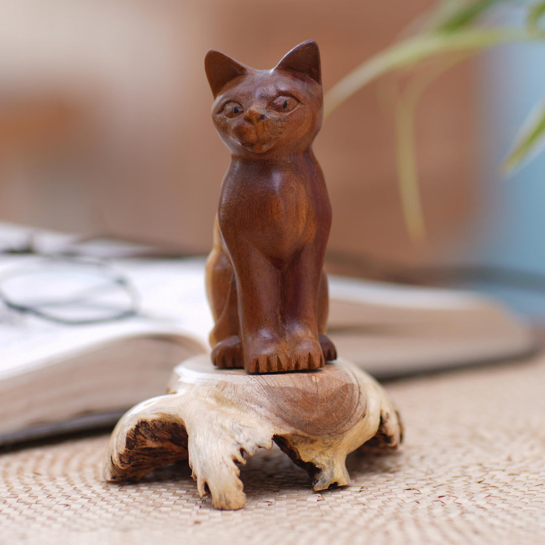 Handcrafted Hibiscus Wood Cat Sculpture - Wary Cat