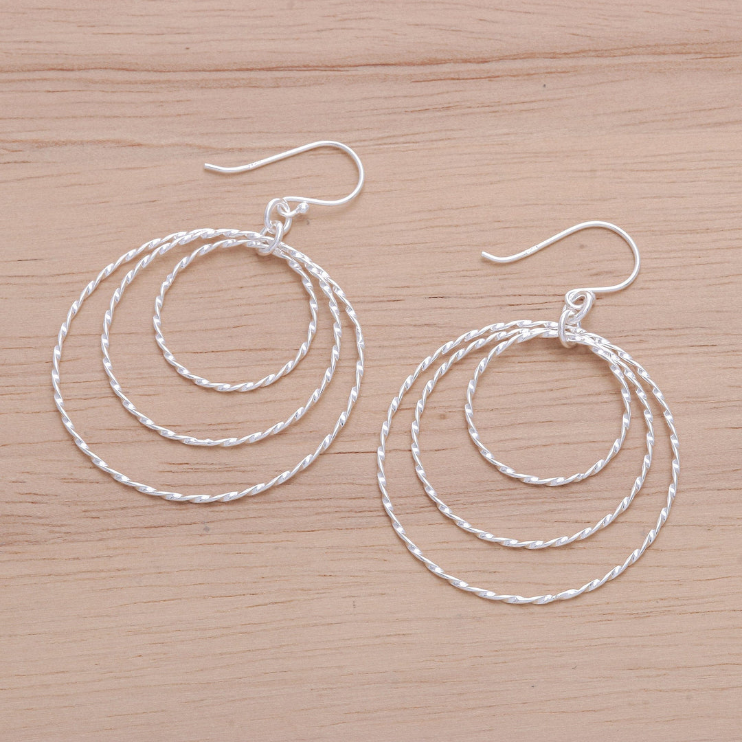 Polished Sterling Silver Dangle Earrings Crafted in Thailand - Avant-Garde Swirls