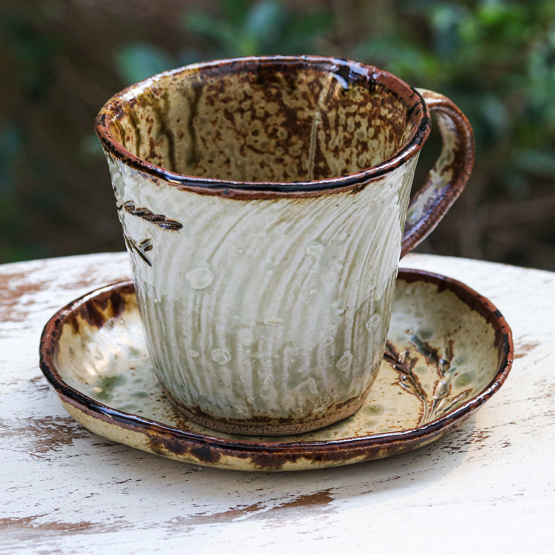 Handcrafted Leafy Brown Ceramic Cup and Saucer from Thailand - Leafy Warmth