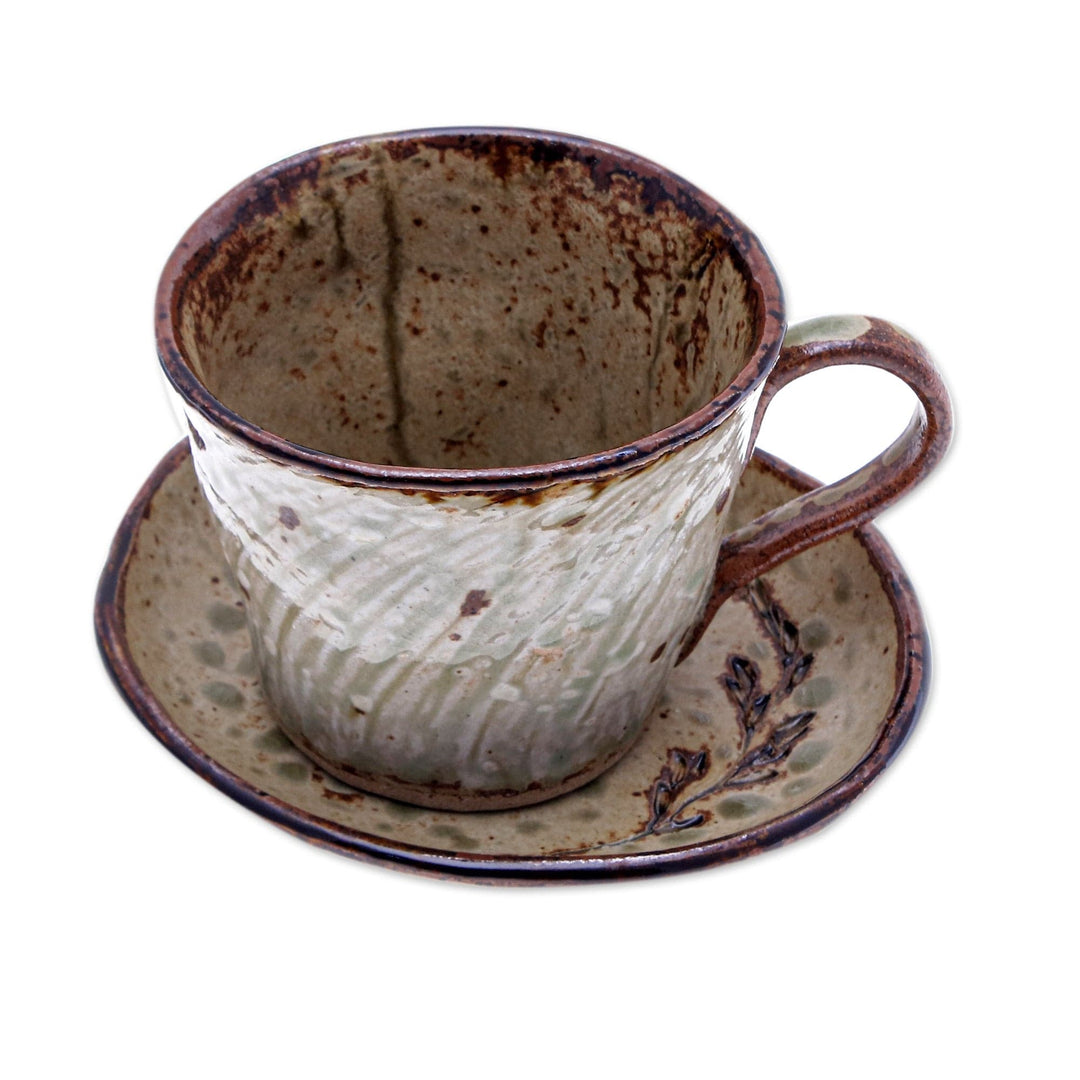 Handcrafted Leafy Brown Ceramic Cup and Saucer from Thailand - Leafy Warmth